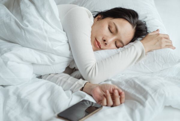 woman sleeps soundly with braces