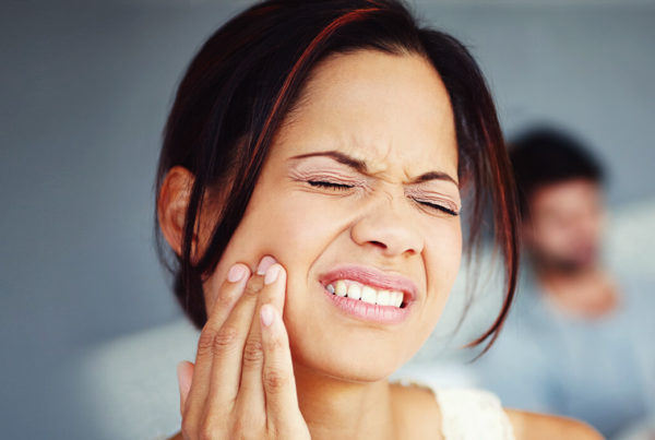 Woman in pain because of bruxism
