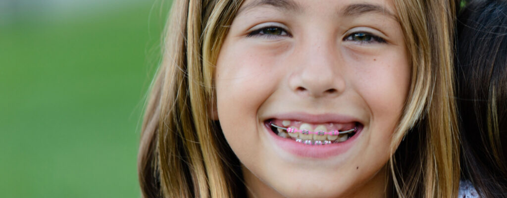 school girl smiles at the office of an Orthodontist in Summerlin Las Vegas