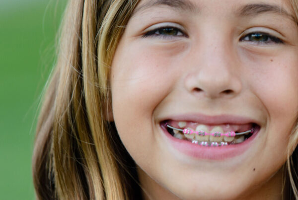 school girl smiles at the office of an Orthodontist in Summerlin Las Vegas