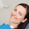 adult at dentist for her dental cleanings with braces