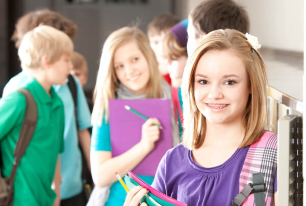 teen girl at school learns How to stop bullies